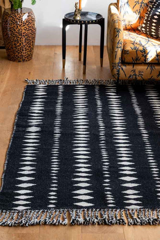 Lifestyle image of the Black & Off-White Geometric Flatweave Rug - Available in 5 Sizes