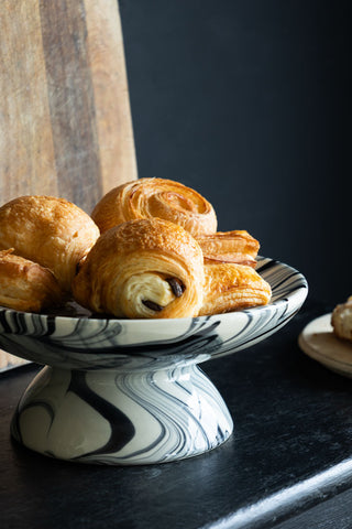 The Black & White Marbled Cake Stand styled with pastries on.