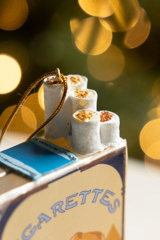 Close-up of the top of the Blue Cigarette Pack Christmas Tree Decoration.