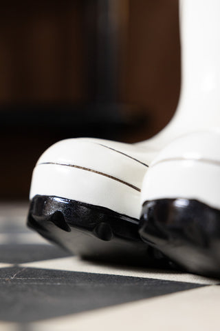 Close-up of the front of the Black & White Wellington Boot Umbrella Stand.