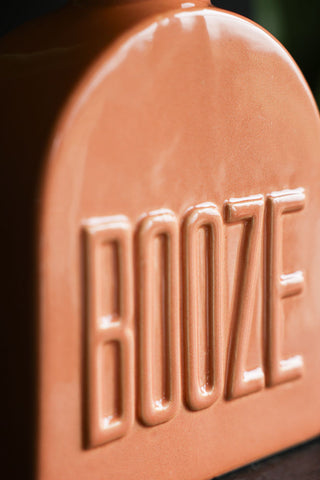 Close-up image of the Orange Booze Vase