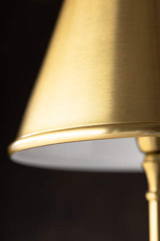 Close-up of the edge of the shade of the Brass Slim Floor Lamp.