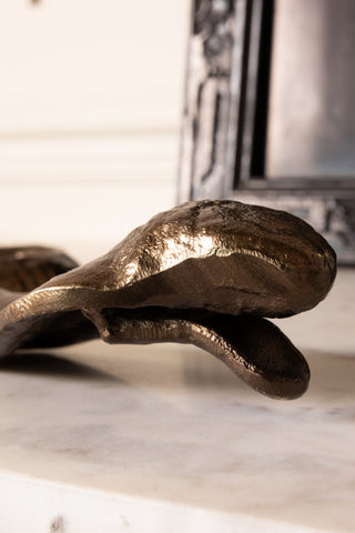The metal texture on the head of the Bronze Cobra Snake Ornament. 