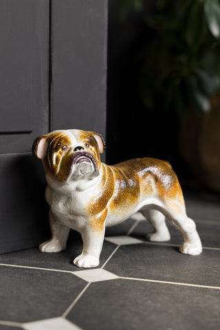 Image of Bulldog Terrier Cast Iron Doorstop shown against a black door. 