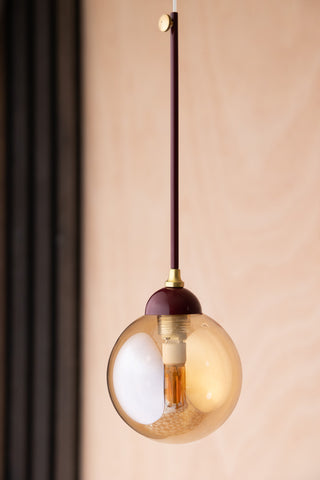 Lifestyle image of the Burgundy Glass Dome Metal Ceiling Light