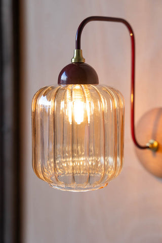 Close-up image of the Burgundy Metal & Ribbed Glass Wall Light on