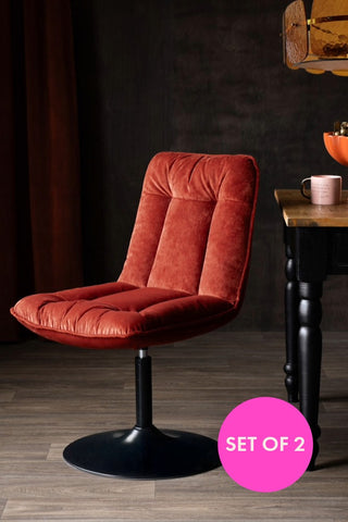The Set of 2 Burnt Orange Velvet Swivel Dining Chairs with a set of 2 badge.