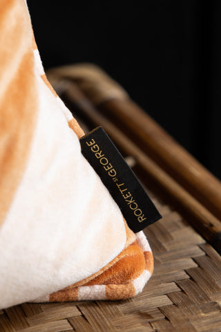 Image of the logo on the Terracotta & Peach Diagonal Stripe Velvet Cushion