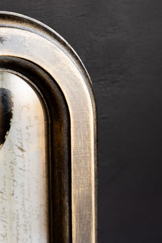 Close-up of the frame of the Vintage-Style Butterfly Framed Wall Art.