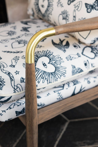 Image of the finish on the Celeste Hearts and Flowers Natural Accent Chair