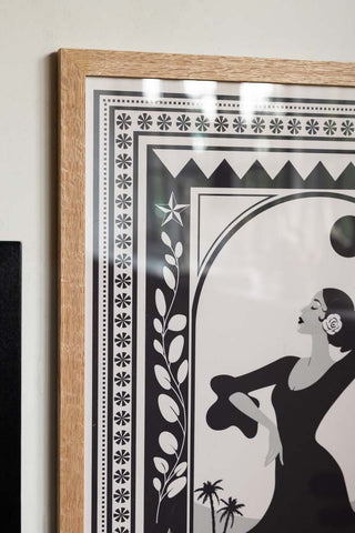 Styled detail image of the Cha Cha A2 Art Print in Black in a natural frame