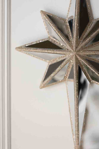 Detail image of the Champagne Gold Mirrored Star Wall Decoration