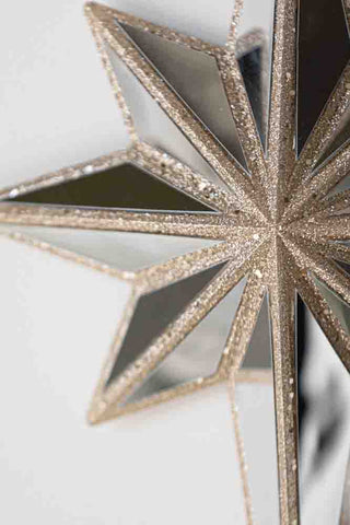 Image of the Champagne Gold Mirrored Star Wall Decoration