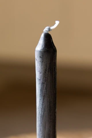 The rustic wax detailing of the Charcoal Dinner Candle & Wax Candle Plate. 