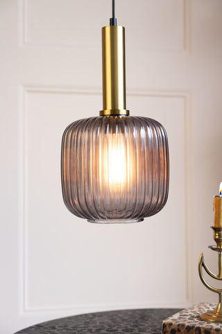 Lifestyle image of the Charcoal Ribbed Glass & Gold Ceiling Light