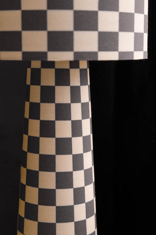 Close-up image of the Charcoal & Natural Checkerboard Floor Lamp base.