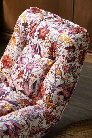 A detailed image of the beautiful floral upholstery on the Charleston Garden Floral Velvet Swivel Chair. 