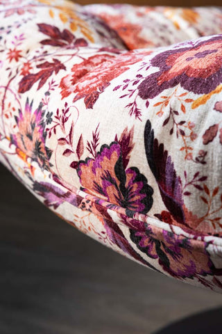 The underneath side on  the Charleston Garden Floral Velvet Swivel Chair. 