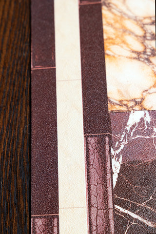 The outside edge of the Checkered Burgundy Marble Effect Durable Runner. 