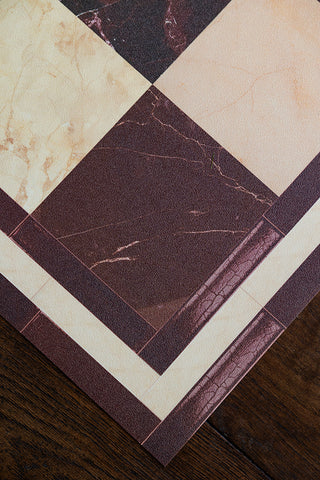 The corner detail of the Checkered Burgundy Marble Effect Durable Runner. 
