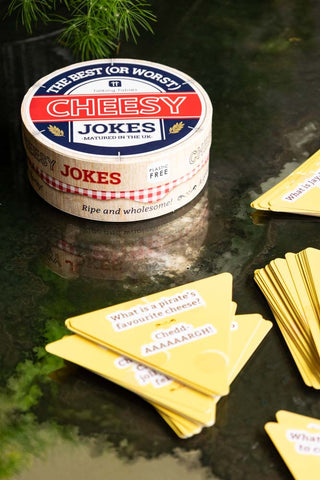 Image of the Cheesy Jokes Party Game on a table
