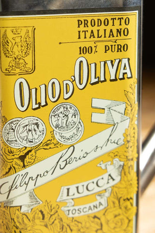 Close-up of the text on the Classic Stainless Steel Olive Oil Dispenser.