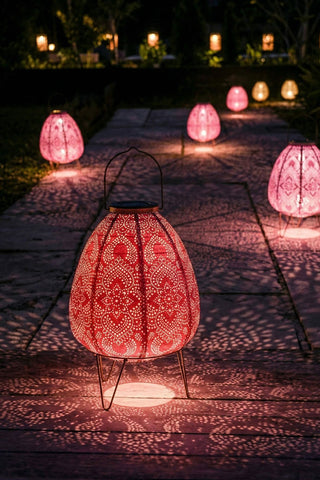 Image of the Coral Dome Outdoor Solar Lantern With Stand lit up