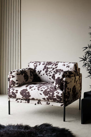 Lifestyle image of the Cowhide Patterned Armchair