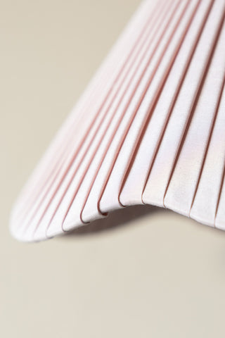Close-up image of the Curved Table Lamp With Pink Pleated Lampshade
