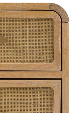 Close-up of the front of the Curved Wood & Rattan Chest Of Drawers on a white background.