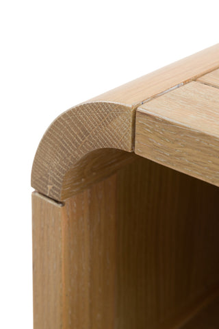 Close-up of the Curved Wood & Rattan Bedside Table on a white background.