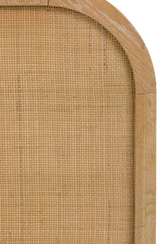 Close-up of the headboard of the Curved Wood & Rattan Bed on a white background.