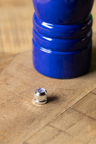 Close-up of one of the toppers included with the Dark Blue Salt/Pepper Mill.