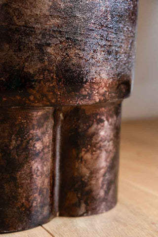 Close-up image of the Dark Copper Mottled Metal Side Table