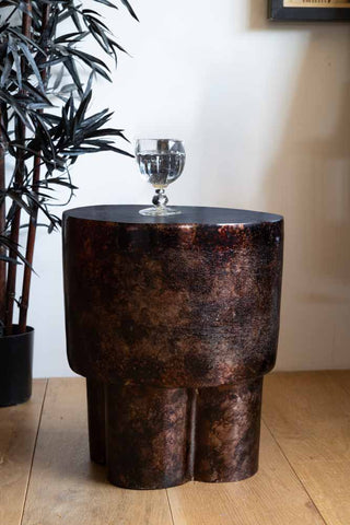 Lifestyle image of the Dark Copper Mottled Metal Side Table