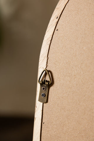 The hanging fixture on the back of the Dark Wood Bobbin Mirror With Shelf. 