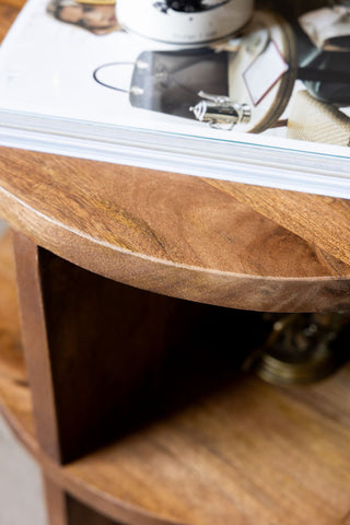 The corner curve of the Dark Wood Shelf Side Table