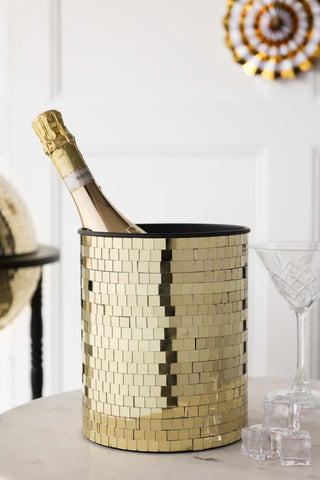 Lifestyle image of the Disco Ball Wine Cooler In Gold