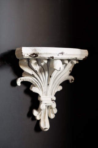 Image of the finish on the Distressed Acanthus Small Wall Shelf