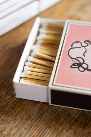 Close-up image of the Divine Luxury Matches by Wanderlust Paper Co.