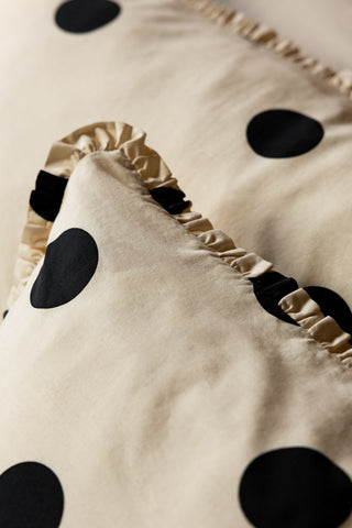 Ruffled pillowcase detail of Dot Noir Ruffled Bedding Set 