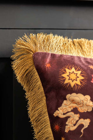Close-up of the corner of the Dreamland Dragon Fringed Velvet Cushion.