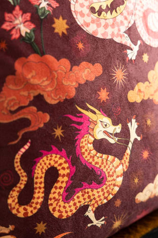 Close-up of the print on the Dreamland Dragon Fringed Velvet Cushion.