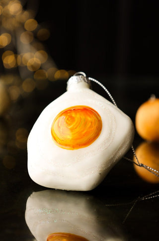 Close-up image of the Fried Egg Glass Christmas Decoration
