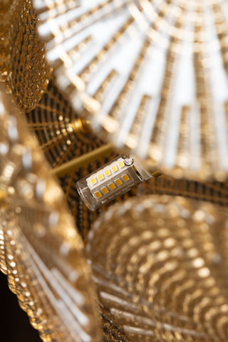 Close-up of the inside of the Elegant Frosted Amber Leaf Ceiling Light.