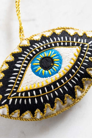 Close-upof the Embroidered Blue Eye Hanging Christmas Tree Decoration.
