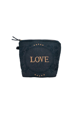 Cutout image of embroidered love cotton pouch on a white background. 