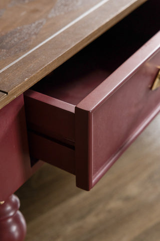 The drawer of the Emporium Brick Red Coffee Table. 