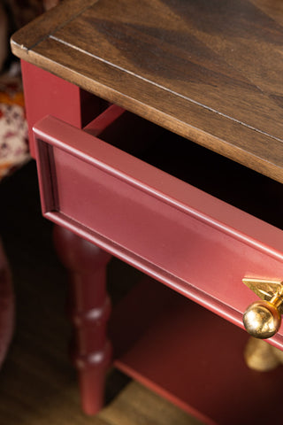 The drawer of the Emporium Brick Red Side Table, shown open. 