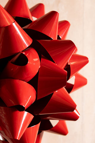 Close-up of the Large Red Gift Bow Christmas Decoration.